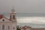 Wolken und Sonne überm Tejo